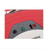 Close-up of the rear port area of a red and gray electronic device, showing a green audio jack, red power jack, and black headphone jack on a white background.